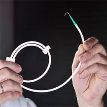 Plasma treatment is used to prepare balloon catheters prior to coating