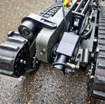 Robotic tracked vehicles are powered by composite CJ and Ultracomp bearings. 